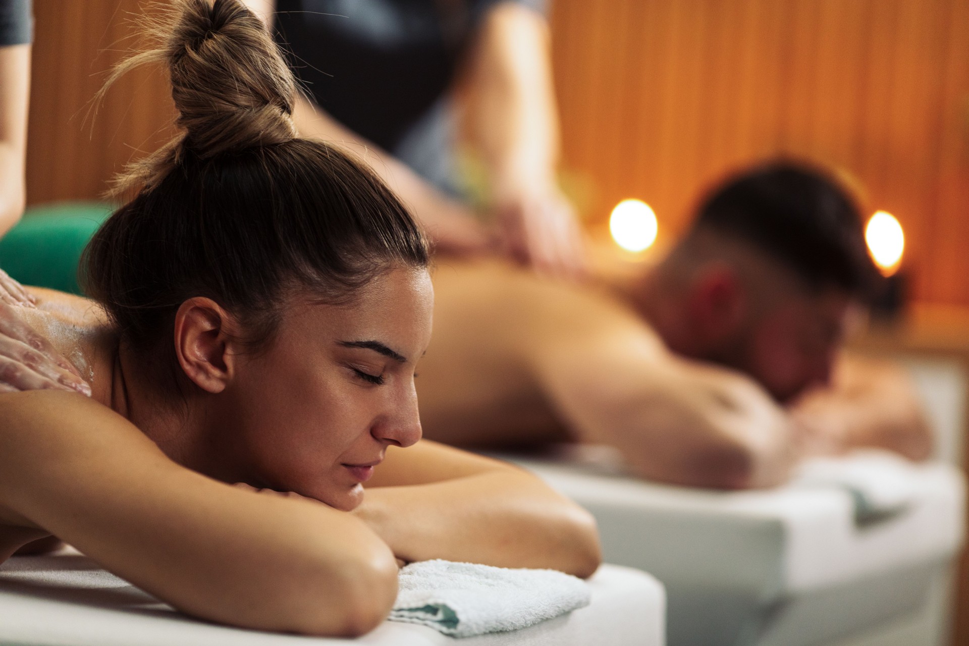Young couple enjoying massage together